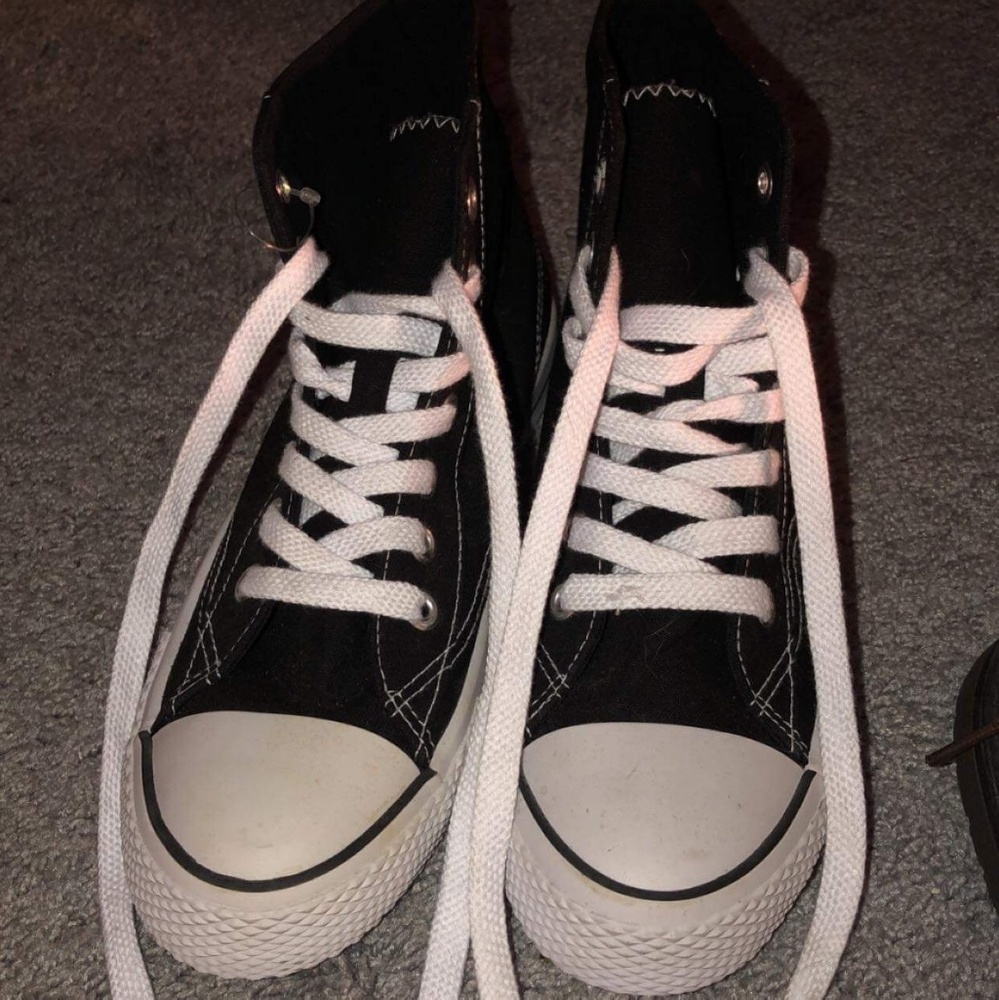 Black high top sneakers